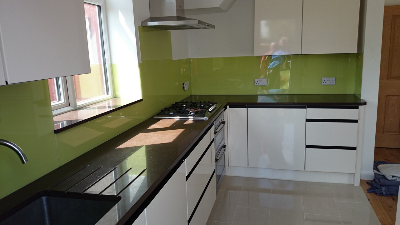 Lime green glass kitchen splashback installed by Kingston upon Thames glaziers